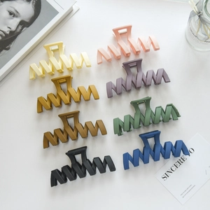 Set of 8 large matte hair claws in various colors for elegant ponytail styling