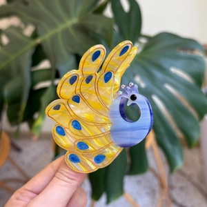 Elegant peacock acetate hair claw clip with colorful marble pattern and rhinestones