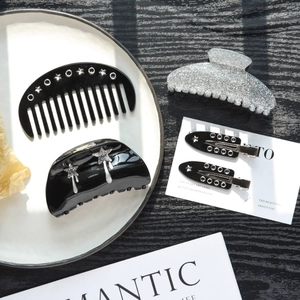 Elegant black acetate hair claw set with rhinestones and silver sparkle accessories