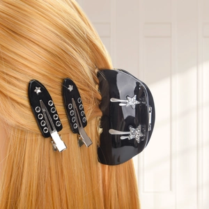 Elegant black acetate hair claw set with sparkling star rhinestones and side clips