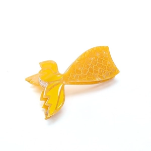 Elegant yellow acetate mermaid tail hair claw clip with detailed fish scale texture