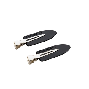 Set of two black matte hair clips with Muwaordy branding and silver metal springs