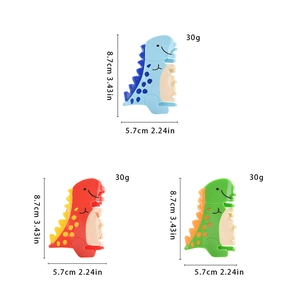 Détail montrant les dimensions et le poids de 30g des pinces à cheveux dinosaure colorées
