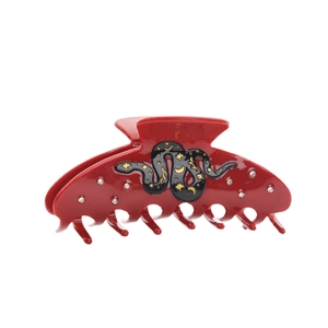 Red acetate shark hair claw clip with crystal rhinestones and black snake motif