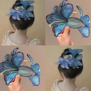 Collage of blue lily hair claw clip showing realistic petals and back view of hairstyle