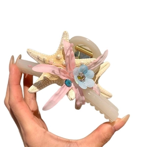 Pince à cheveux série océan avec fleurs de lys étoile de mer et strass bleus