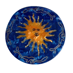Creative sun pattern hair claw clip in navy blue acetate with golden sunburst details