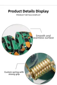 Detail view of smooth green floral hair claw clip with strong gold metal spring mechanism
