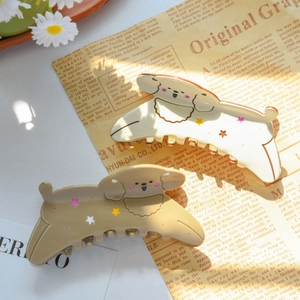 Mollette per capelli a forma di cane in acetato crema e kaki con stelle colorate