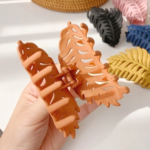 Elegant matte leaf hair claw clip in burnt orange with various color options