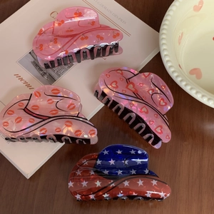 Set of four cowboy hat hair claws made of pearlized acrylic with trendy patterns