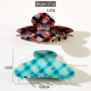 Classic plaid checkered hair claw clips set in red and green for thick hair styling
