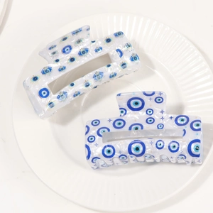 Blue Evil Eye printed PVC hair claw clips for women with elegant white aesthetic