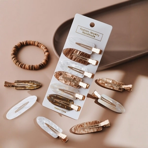 Set di fermagli per capelli in acetato con motivi a marmo e tartarugati eleganti