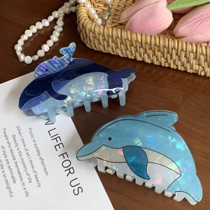 Pearlescent blue dolphin hair claws in dark and light shades for women styling