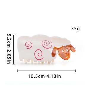Detail view of cartoon sheep hair claw clip showing precise measurements 10.5cm by 5.2cm