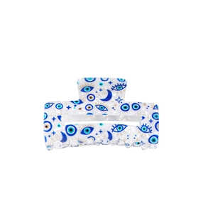 Elegant rectangle hair claw clip with blue evil eye and moon star patterns on white