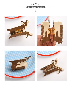 Detail view showing goat shaped acetate hair claw clip from multiple angles