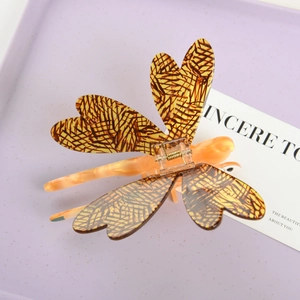 Retro dragonfly hair claw clip with amber tortoise shell texture acetate finish