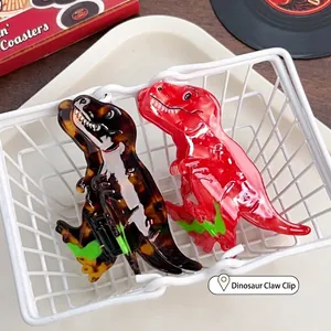 Cartoon dinosaur hair claw clips in tortoiseshell and red acetate finishes