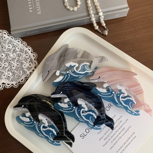 Elegant dolphin shaped acetate hair claws in four colors for women with ocean wave design