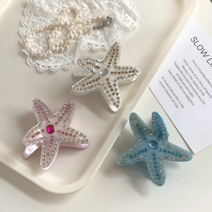 Pinces à cheveux en forme d'étoile de mer avec strass en rose, blanc et bleu