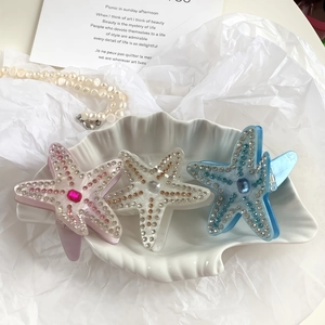 Pinces à cheveux étoile de mer en acétate avec strass, tons rose, blanc et bleu ciel