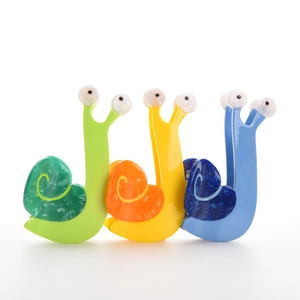 Set di tre mollette per capelli a forma di lumaca in acetato colorato con design creativo