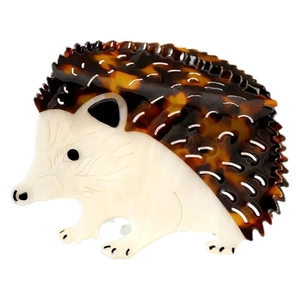 Detailed close-up of a hedgehog shaped hair claw clip made from high quality acetate