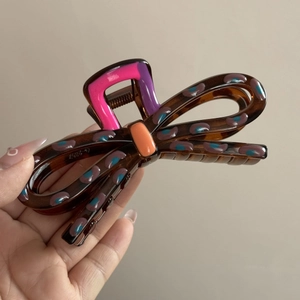 Brown tortoiseshell butterfly hair claw clip with colorful resin accents for thick hair