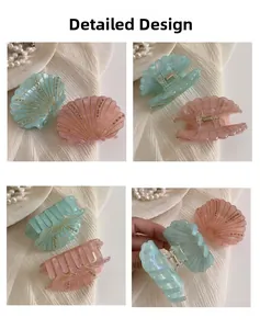 Vues détaillées des pinces à cheveux en forme de coquillage avec strass et dorures
