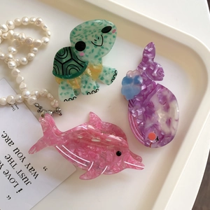 Set of 3 acetate ocean animal hair claws featuring turtle and dolphin designs