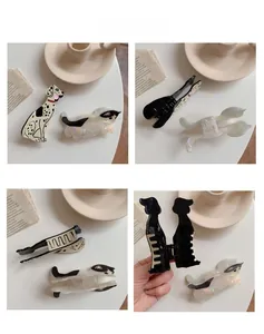 Detail of the high-quality acetate hair claw clip featuring cute animal shapes