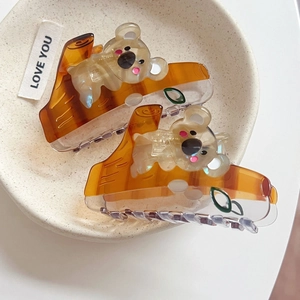 Cute acetate koala hair claw clips for women in translucent brown and grey tones