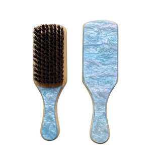 Lot de peignes à cheveux en acétate bleu marbré avec manche en bois naturel