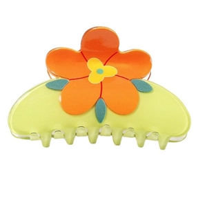 Pince à cheveux florale avec pétales orange et base verte pour coiffure femme