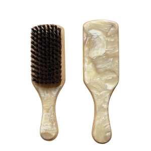 Peigne à cheveux élégant en acétate de cellulose avec motif marbre et poils de massage
