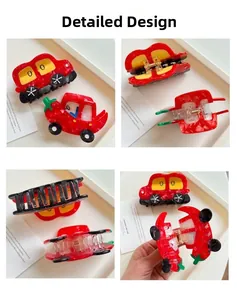 Detail of red cartoon bus and strawberry hair claws with secure metal spring and teeth