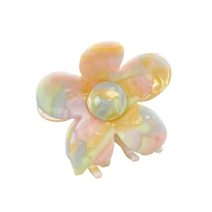 Pince à cheveux fleur élégante en acétate marbré pastel avec fermeture à ressort