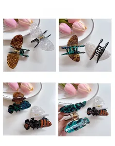 Détails des différentes couleurs et motifs des pinces à cheveux abeille en acétate