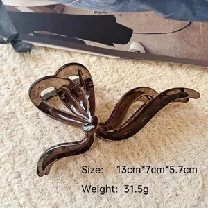 Pince à cheveux marron translucide en forme de ruban, taille 13cm x 7cm, poids 31.5g