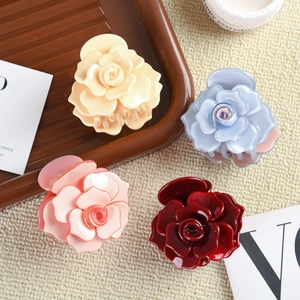 Pinces à cheveux élégantes en forme de rose aux tons pastel pour coiffures femmes