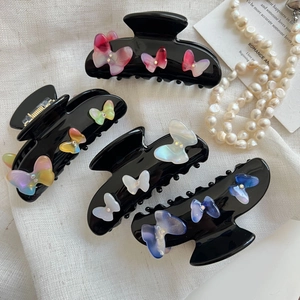 Elegant set of 4 black acetate hair claws with gradient acrylic 3D butterflies and crystals