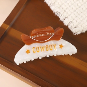 Pince à cheveux design chapeau de cow-boy avec texture marbre et strass étincelants