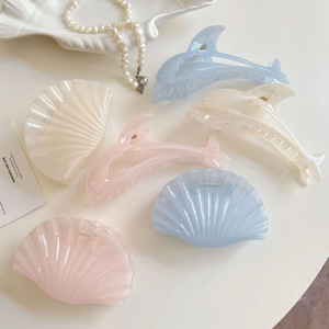 Jelly macaron dolphin and shell hair claws in blue, pink, and cream for beach vacation