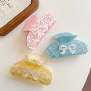 Pink and blue marble texture acetate hair claws with rhinestone bow design set