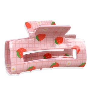 Pink checkered hair claw clip with strawberry and daisy floral prints for women