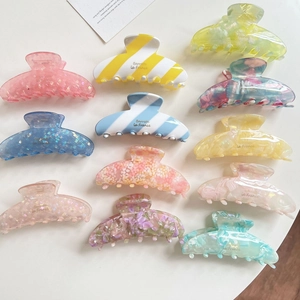 Set of vintage acetate checkered hair claws with various colors and marble patterns