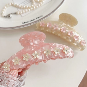 Pince à cheveux en acétate avec fleurs de cerisier et strass au style élégant
