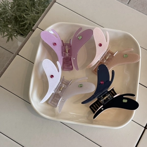 Pinces à cheveux papillon élégantes avec strass colorés en violet, rose et noir chic